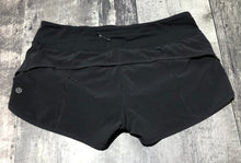 Load image into Gallery viewer, lululemon black shorts - Hers size 8
