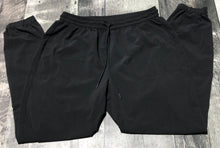 Load image into Gallery viewer, TNA black high rise pants - Hers size M
