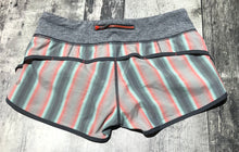 Load image into Gallery viewer, lululemon grey/pink/turquoise shorts - Hers size 6
