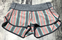 Load image into Gallery viewer, lululemon grey/pink/turquoise shorts - Hers size 6
