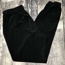 Load image into Gallery viewer, TNA black high rise pants - Hers size M
