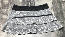 Load image into Gallery viewer, lululemon grey/white/black athletic skort - Hers size 8
