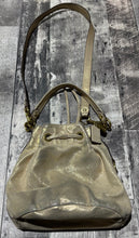 Load image into Gallery viewer, Coach gold small purse
