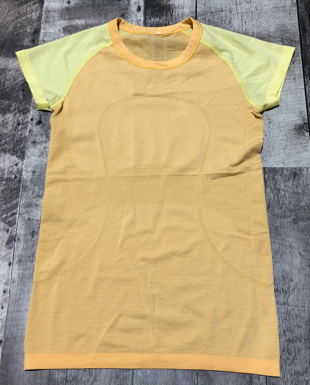 lululemon orange/yellow athletic tshirt - Hers size 6