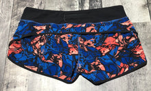 Load image into Gallery viewer, lululemon black/blue/orange shorts - Hers size 10
