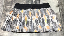 Load image into Gallery viewer, lululemon light grey/peach/grey skort - Hers size 6
