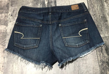 Load image into Gallery viewer, American Eagle dark blue high rise denim shorts - Hers size 10
