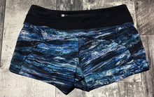 Load image into Gallery viewer, lululemon black/blue shorts - Hers size 6
