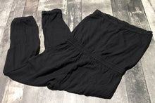 Load image into Gallery viewer, Talula black sleeveless jumpsuit - Hers size M

