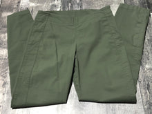 Load image into Gallery viewer, Kit and Ace green mid rise pants - Hers size 4
