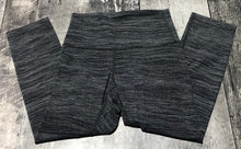 Load image into Gallery viewer, lululemon black/white crop leggings - Hers size 4
