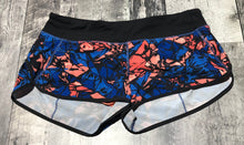 Load image into Gallery viewer, lululemon black/blue/orange shorts - Hers size 10
