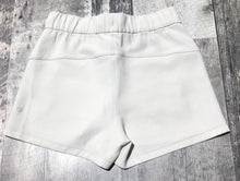 Load image into Gallery viewer, lululemon off white athletic shorts - Hers size 4
