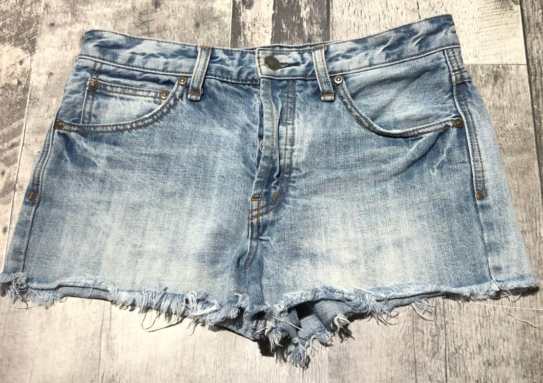 Free People blue mid rise denim shorts - Hers size 27