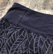 Load image into Gallery viewer, lululemon purple athletic shorts - Hers size 4
