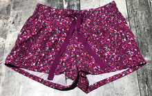 Load image into Gallery viewer, lululemon purple/green shorts - Hers size 8
