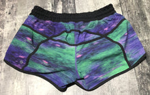 Load image into Gallery viewer, lululemon purple/green/black shorts - Hers size 8
