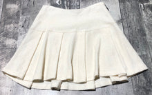 Load image into Gallery viewer, BCBG cream mini skirt - Hers size 2
