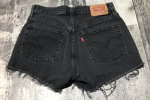 Load image into Gallery viewer, Levi’s black high rise denim shorts - Hers size 26
