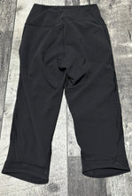 Load image into Gallery viewer, lululemon black capris - Hers size 4
