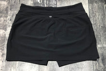 Load image into Gallery viewer, lululemon black skort - Hers size 10

