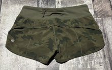 Load image into Gallery viewer, lululemon green camo shorts - Hers size 4
