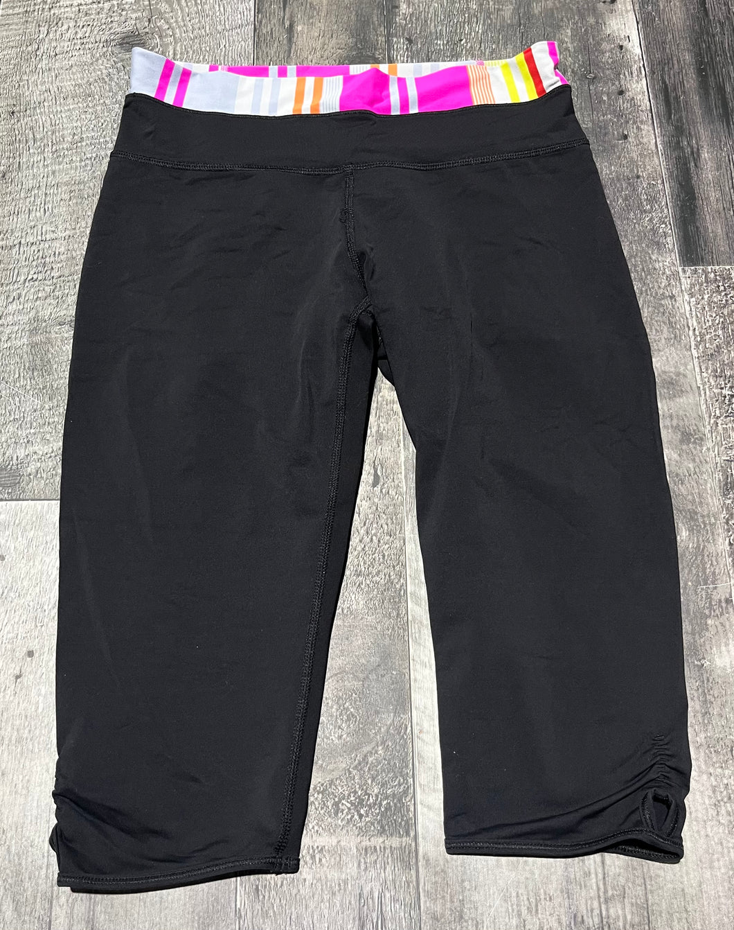 lululemon black/pink/yellow capris - Hers size approx S