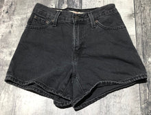 Load image into Gallery viewer, Levis black high rise denim shorts - Hers size 23
