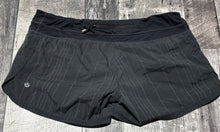 Load image into Gallery viewer, lululemon black shorts - Hers size 10
