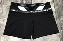 Load image into Gallery viewer, lululemon black/white shorts - Hers size 6
