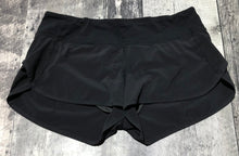 Load image into Gallery viewer, lululemon black shorts - Hers size 8
