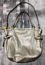 Load image into Gallery viewer, Coach champagne purse
