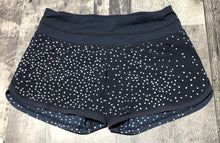 Load image into Gallery viewer, lululemon navy/white athletic shorts - Hers size 4
