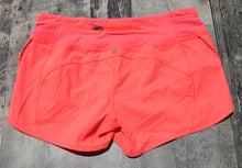 Load image into Gallery viewer, lululemon neon orange athletic shorts - Hers size 8
