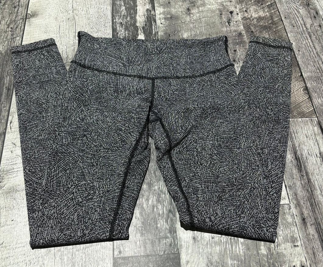 lululemon white/black leggings - Hers size 6