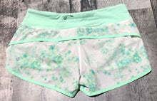 Load image into Gallery viewer, lululemon white/mint athletic shorts - Hers size 6
