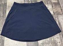 Load image into Gallery viewer, Lolë navy skort - Hers size XS
