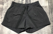 Load image into Gallery viewer, lululemon black shorts - Hers size 4
