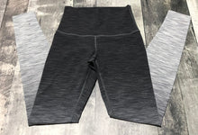 Load image into Gallery viewer, lululemon black/grey leggings - Hers size 8
