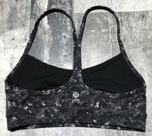 Load image into Gallery viewer, lululemon black/white/grey sports bra - Hers size 4
