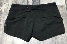 Load image into Gallery viewer, lululemon black athletic shorts - Hers size 4
