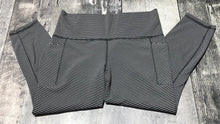 Load image into Gallery viewer, Athleta black/white mid rise crop leggings - Hers size M
