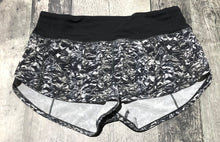 Load image into Gallery viewer, lululemon grey/black/white athletic shorts - Hers size 4
