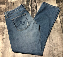 Load image into Gallery viewer, AG blue mid rise ankle slim jeans - Hers size 28
