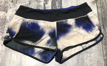 Load image into Gallery viewer, lululemon beige/blue/black shorts - Hers size 8
