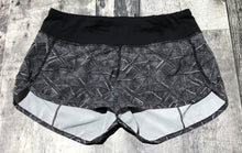 Load image into Gallery viewer, lululemon black/white shorts - Hers size 2
