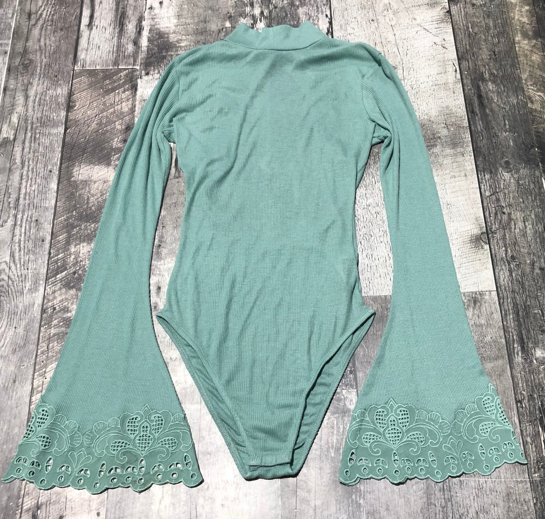 Free People turquoise body suit - Hers size S