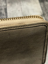 Load image into Gallery viewer, Coach gold wallet

