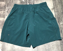 Load image into Gallery viewer, lululemon teal shorts - His size M
