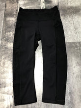 Load image into Gallery viewer, lululemon black capri leggings - Hers size 4
